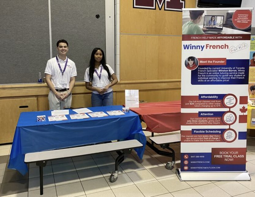 The Winny French for Kids team at their conference booth